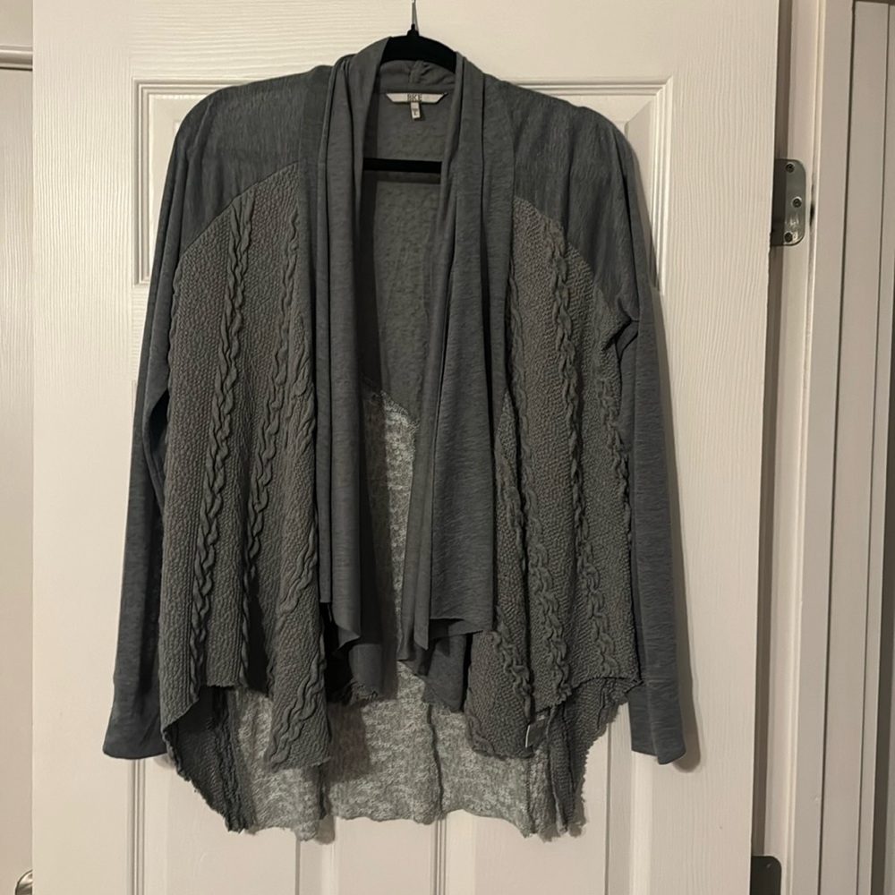 Buckle top. Jacket.